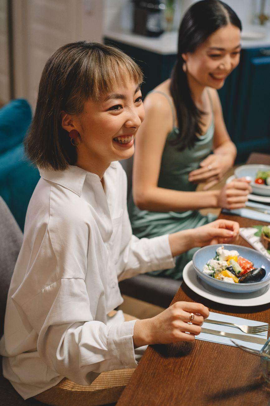 Two diners sharing a meal at a table