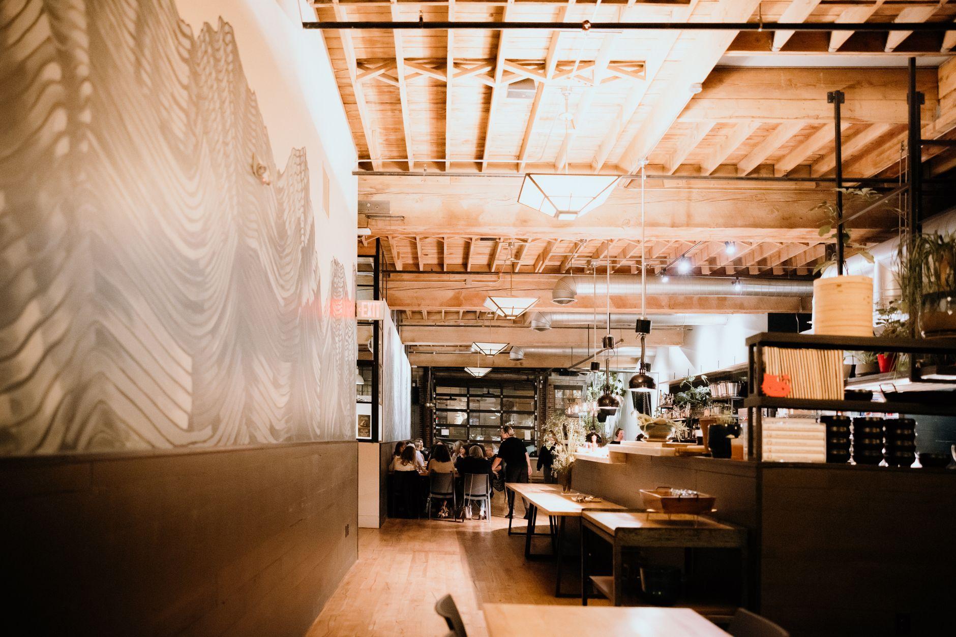 A café interior with staff working the counter